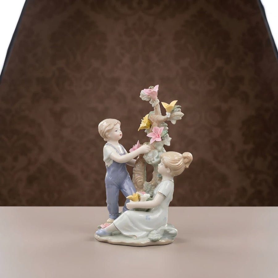 Blooming Love Ceramic Couple Showpiece