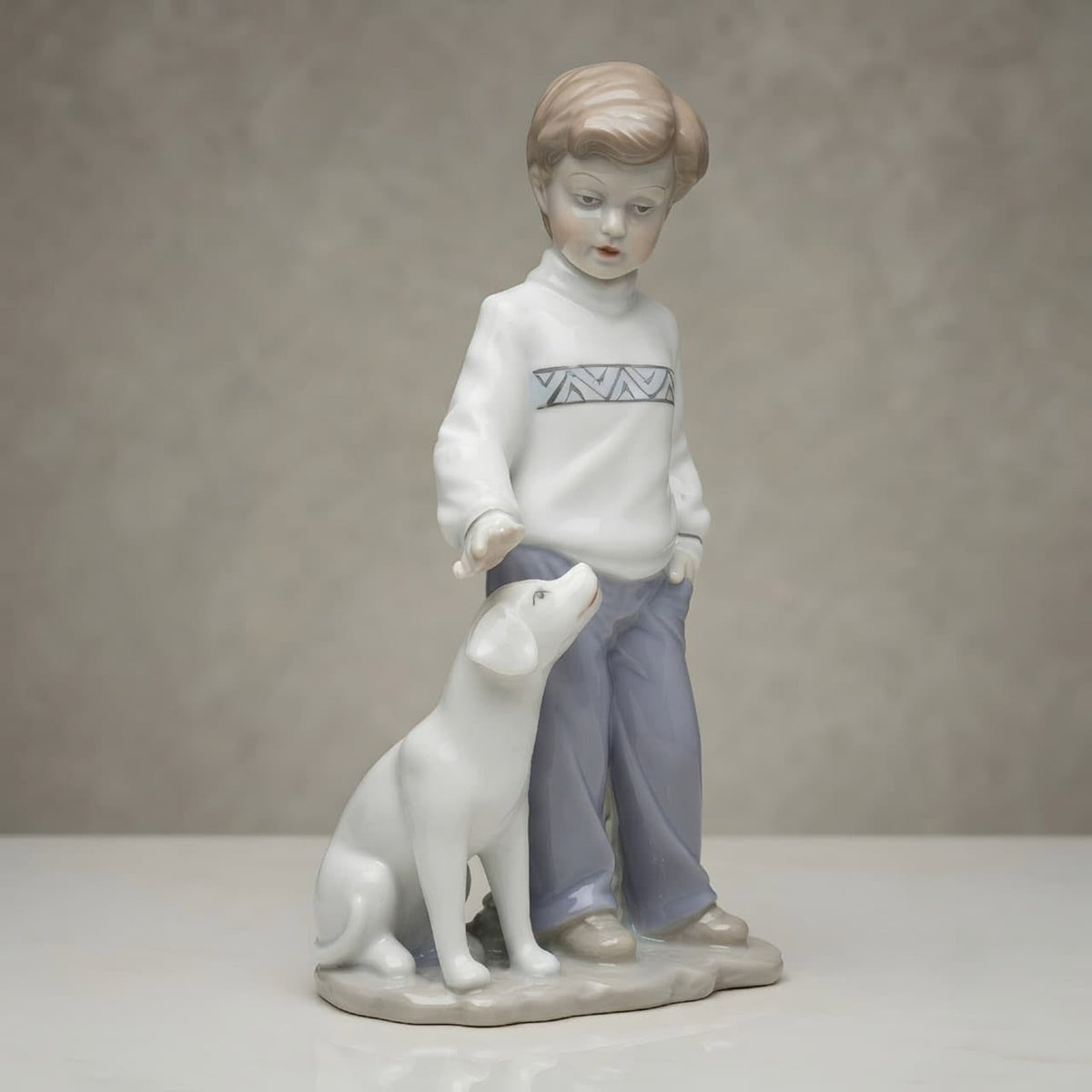 Premium Ceramic Boy with Dog Showpiece GI008, angled view